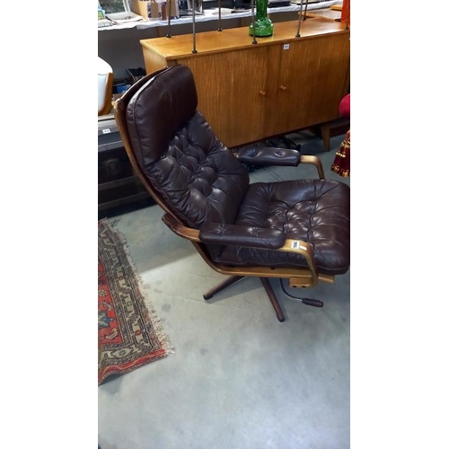 1646 - A Danish? teak & leather swivel chair COLLECT ONLY.