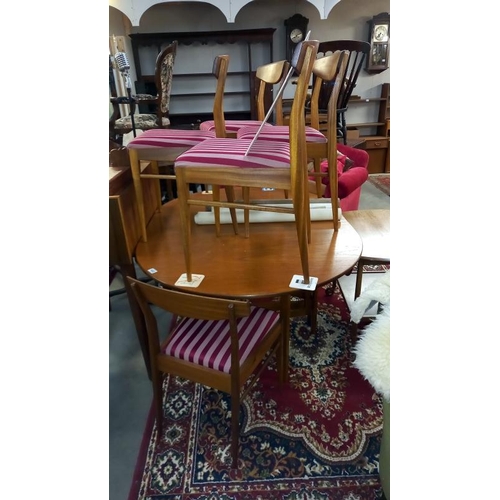 1652 - A 1970's teak dining table & 6 chairs COLLECT ONLY.