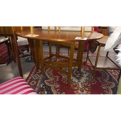 1652 - A 1970's teak dining table & 6 chairs COLLECT ONLY.