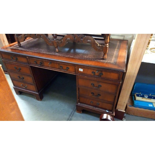 1677 - A mahogany double pedestal desk with leather inset top, COLLECT ONLY.