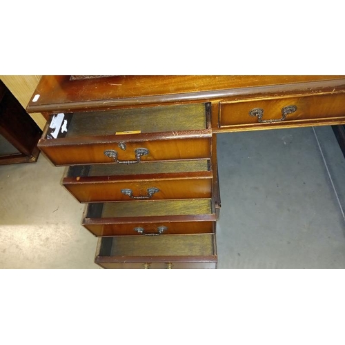 1677 - A mahogany double pedestal desk with leather inset top, COLLECT ONLY.