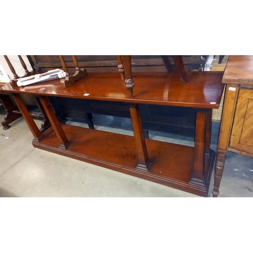 1684 - A long Edwardian mahogany wall unit on 6 tapered pillar legs COLLECT ONLY.