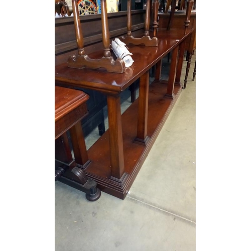 1684 - A long Edwardian mahogany wall unit on 6 tapered pillar legs COLLECT ONLY.