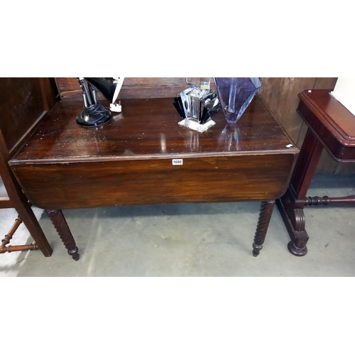 1690 - An Edwardian mahogany Pembroke table on turned legs COLLECT ONLY.