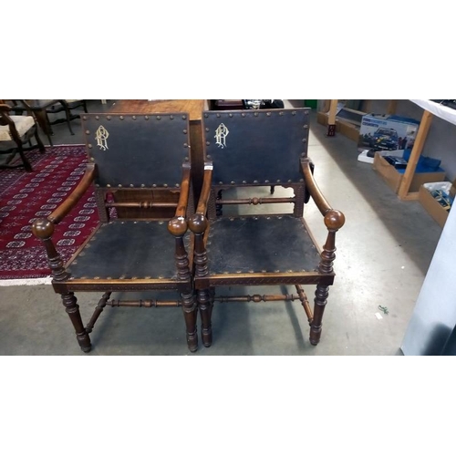 1692 - A pair of Georgian mahogany monogrammed carver chairs with large buttoned leather panels COLLECT ONL... 