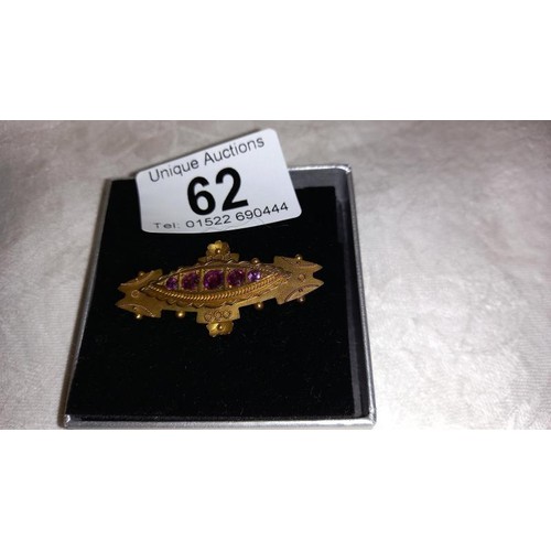 62 - A 9ct gold brooch, Chester hall mark dated 1909, amethyst set.