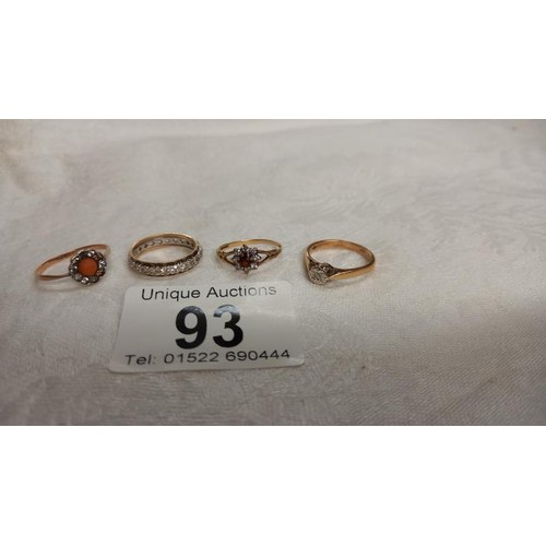 93 - A diamond single stone gold ring, a gold band ring and two other vintage rings, assorted stones.