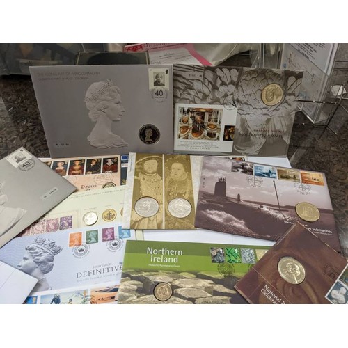 200H - A collection of 15 coin/stamp covers.