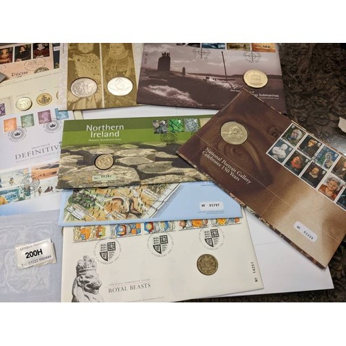 200H - A collection of 15 coin/stamp covers.