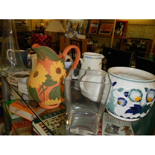 114 - A mixed lot including jugs, vases, jardiniere, mugs etc.,