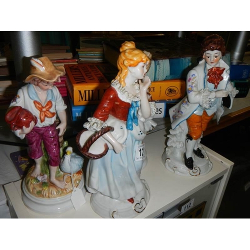 121 - A mixed lot of porcelain figures.