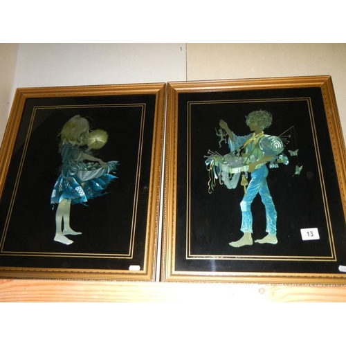 13 - A pair of framed and glazed silver foil pictures.