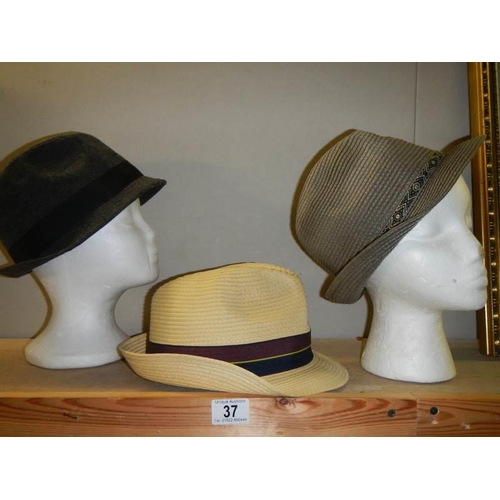 37 - Three gentleman's hats.