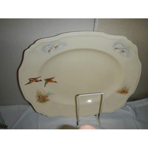 7 - A set of three graduated Alfred Meakin meat platters depicting ducks.