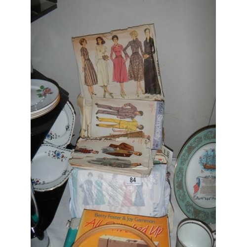 84 - A quantity of old dress patterns etc.,