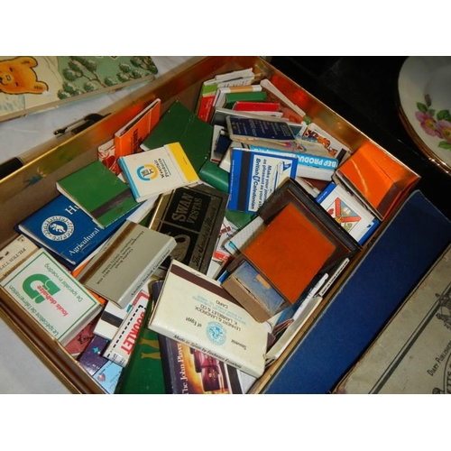 192 - A mixed lot of stamps, match boxes etc.,