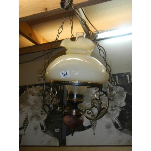 194 - An oil lamp style ceiling lamp. COLLECT ONLY.