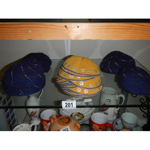 201 - A quantity of fabric skull caps.