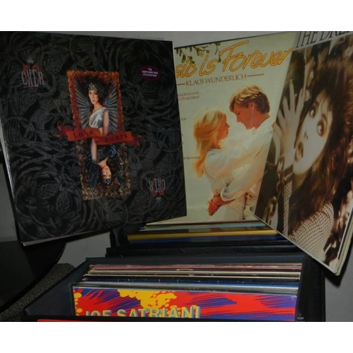 32 - A good lot of LP records including Ozzy Osbourne, Motorhead, James Last, classical etc.,