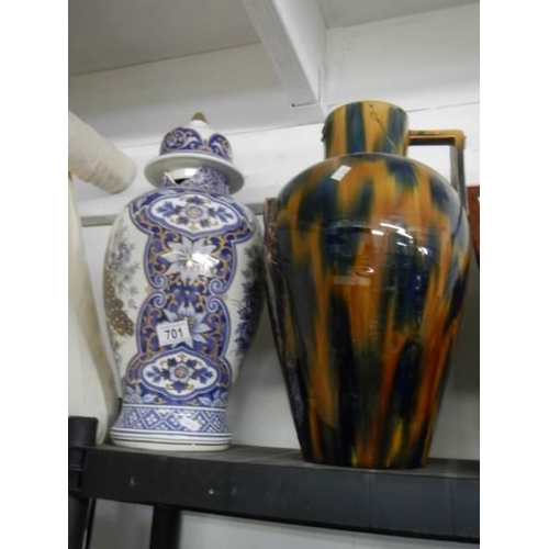 701 - A large Oriental vase, a/f. and one other.