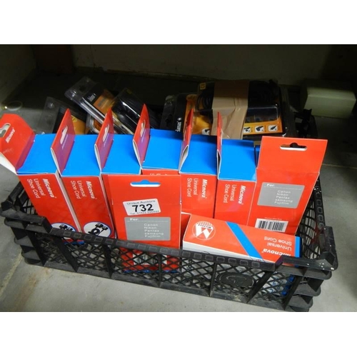 732 - A quantity of new packaged Canon, Nikon, Pentax etc., Universal shoe card etc.,