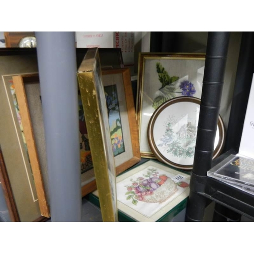 750 - A quantity of framed tapestries.