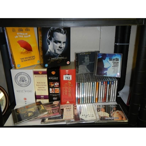 753 - A quantity of CD's and DVD's including Agatha Christie, James Cagney, Louis Armstrong etc.,