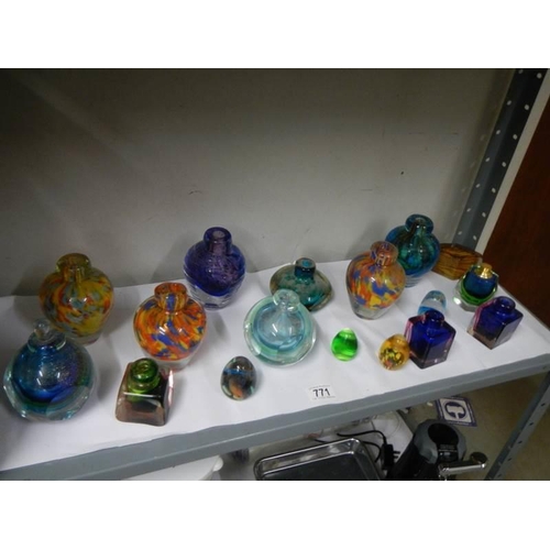 771 - A good lot of studio glass bud vases.