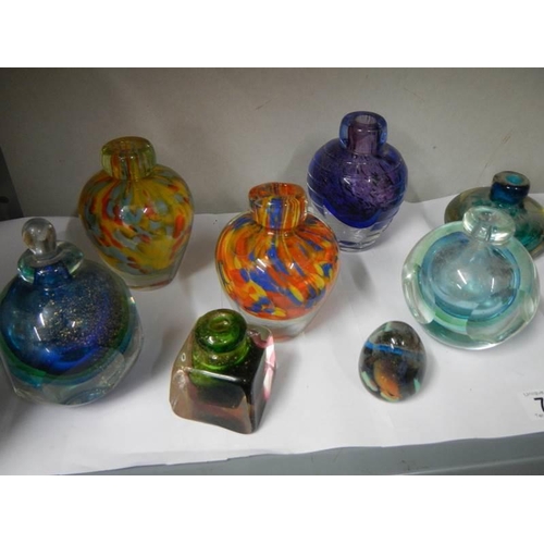 771 - A good lot of studio glass bud vases.