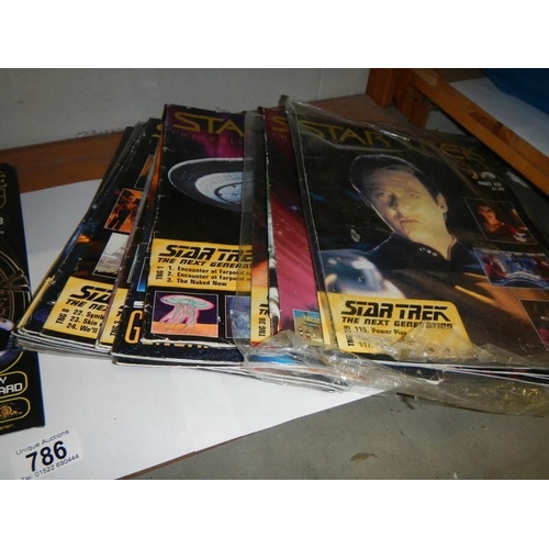 786 - A quantity of Star Trek and Stargate magazines.