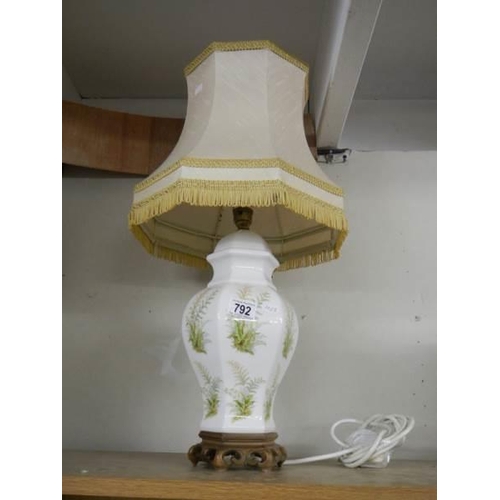 792 - An oriental style ginger jar table lamp.