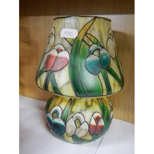 795 - A Tiffany style painted glass tea lamp and two others.