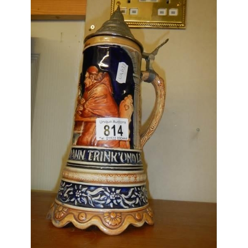 814 - A musical beer stein with Swiss movement.