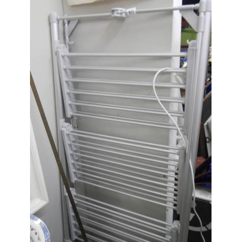 831 - An electric towel rail in working order, COLLECT ONLY.