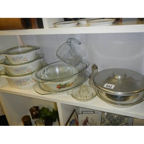 842 - A set of graduated Pyrex lidded dishes etc.,