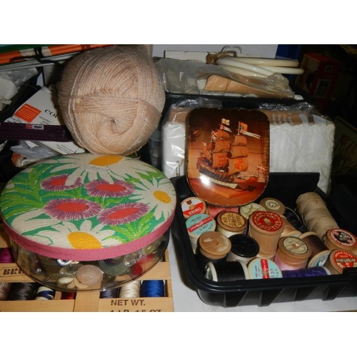 851 - A large lot of vintage sewing threads, cotton reels etc.,