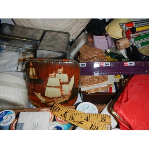 851 - A large lot of vintage sewing threads, cotton reels etc.,