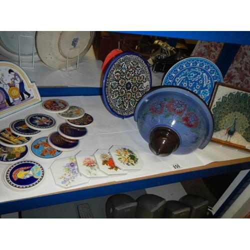 856 - A mixed lot of Greek pottery including coasters, Guernsey pottery wall pocket etc.,