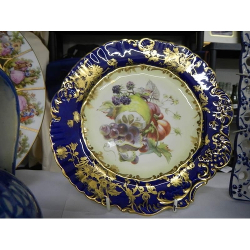 873 - A quantity of collector's cabinet plates, Noritake vase, West German and Delft ewers.