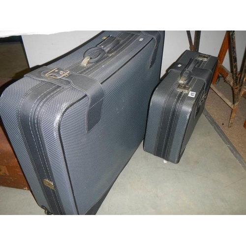 875 - Two good quality suitcases.