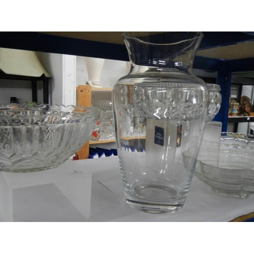 892 - Four glass fruit bowls and a vase.