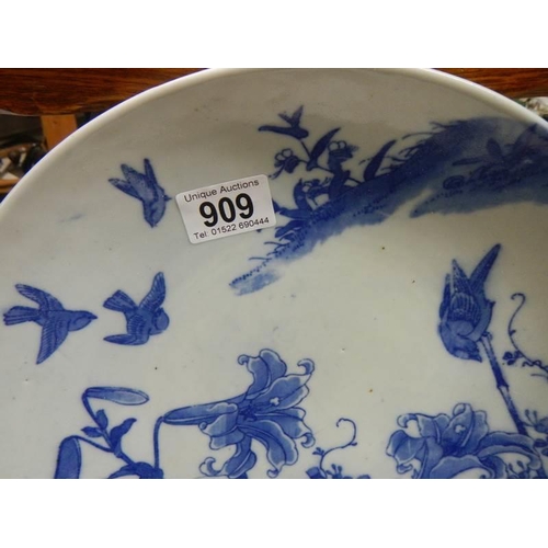 909 - An early 20th century Chinese style blue and white plate.