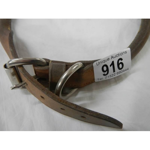 916 - An old leather dog collar.