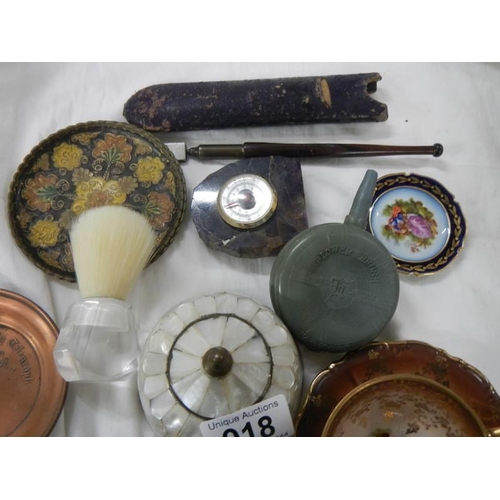 918 - A mixed lot including mother of peal lidded pot, copper ash tray, cup and saucer etc.,