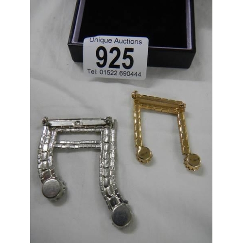 925 - Two sparkly music note brooches.