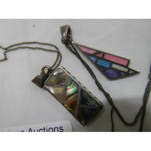 937 - Two silver pendants.