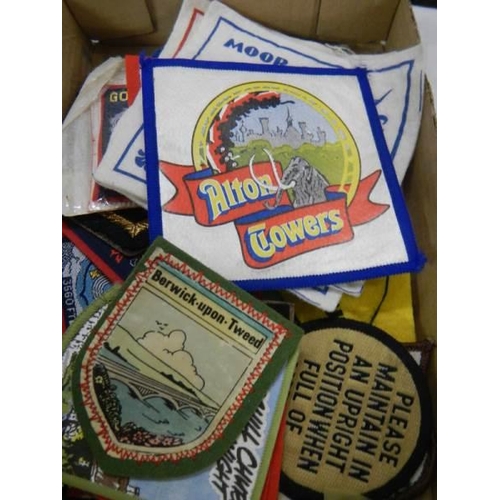 940 - A quantity of vintage cloth tourist badges.