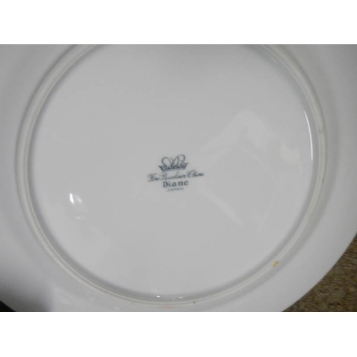 981 - A quantity of Diane fine porcelain made in Japan dinner plates.