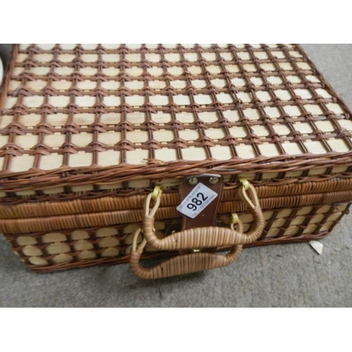 982 - A wicker picnic hamper.