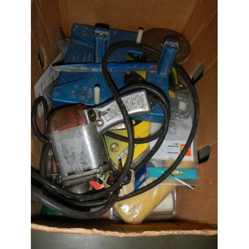 990J - A box of assorted tools.